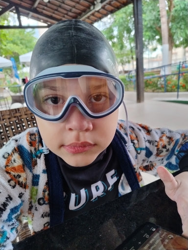 Customer photo - boy at pool wearing goggles