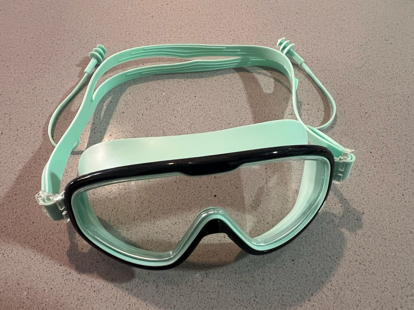 Customer photo - mint goggles on counter